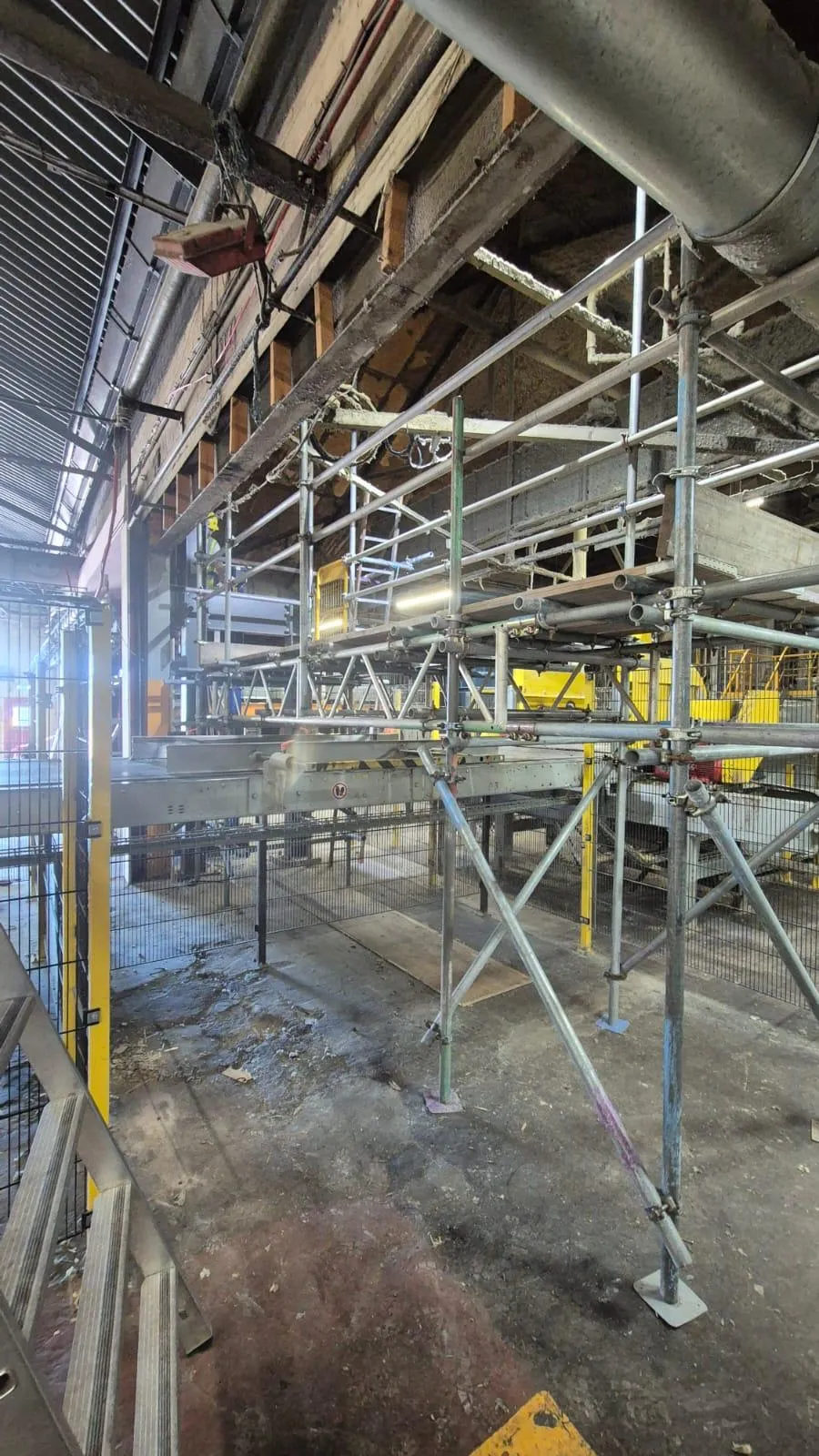 Scaffolding built inside an industrial building